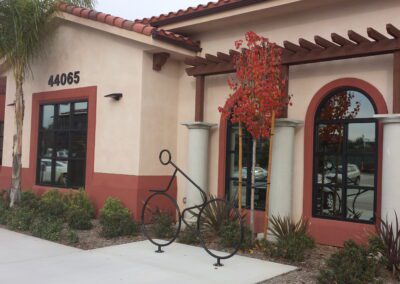 A bicycle is parked outside of a building.