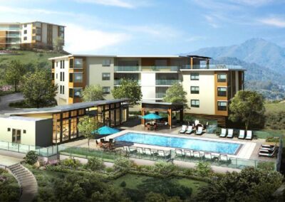 A rendering of an apartment complex with a swimming pool.